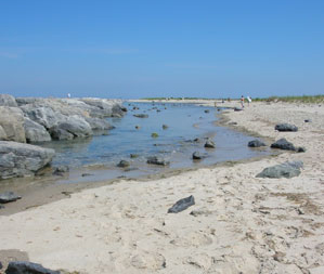 beach near lighthouse hightide